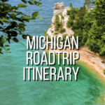 Scenic Michigan coastline with cliffs and lush greenery for summer road trip.